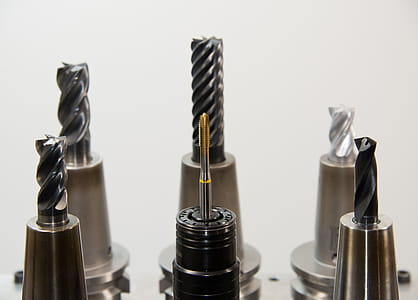 Close Up Photo of Black Metal Drill Bit thumbnail