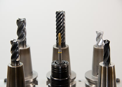 six drill bits on white surface thumbnail