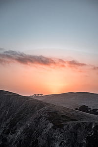 gray hills during sunset thumbnail