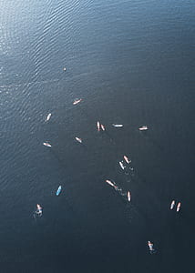 aerial photography of boat on water at daytime thumbnail