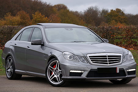 2012 gray Mercedes-Benz CLS sedan on road near bushes during daytime thumbnail
