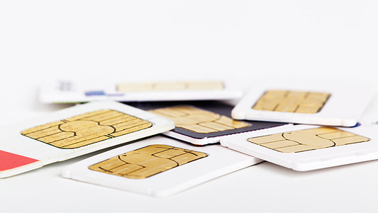 assorted sim cards on white surface thumbnail