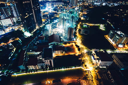 city buildings during nighttime in aerial view photography thumbnail