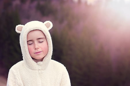 shallow focus photography of person in white bear costume thumbnail