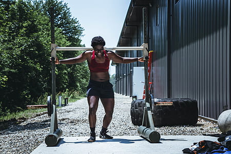 woman wearing red sport bra thumbnail