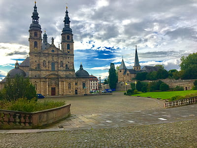 beige and brown concrete cathedral during daytime thumbnail