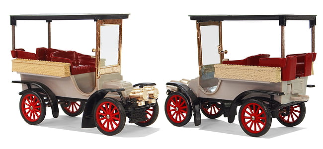 two brown-red-and-black vehicles thumbnail