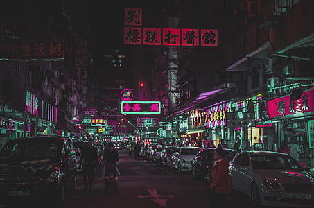 people walking on street between stores thumbnail