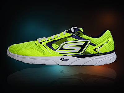 green and white low-top running shoe thumbnail