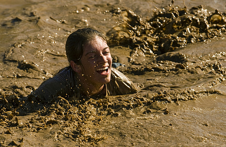 person submerged in mud thumbnail
