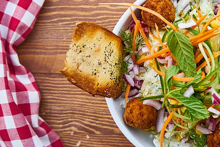 vegetable salad with bread toast served on white ceramic bowl thumbnail