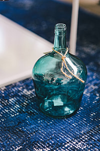 Coloured decorational bottles in various places thumbnail