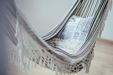 white and beige hammock with pillows thumbnail