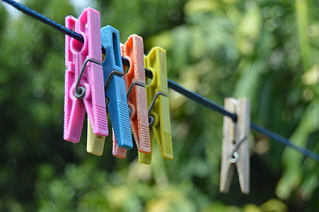 close up photo of clothes pins thumbnail