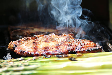 grilled meat with smoke thumbnail