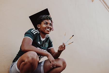 Woman Wearing Green And White Adidas Jersey Shirt thumbnail