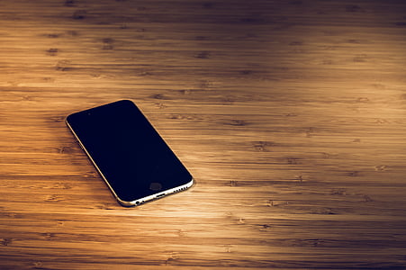 black iPhone 7 with black case thumbnail