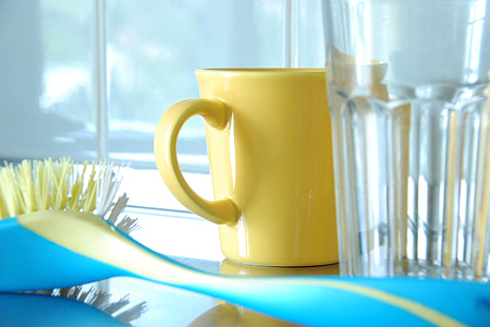 yellow mug and clear glass cup thumbnail