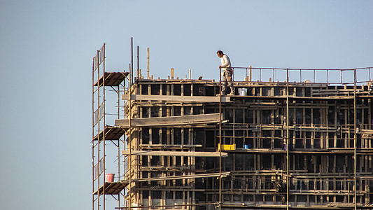 man standing on scaffolding thumbnail
