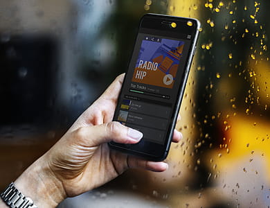Person Holding Black Smartphone thumbnail