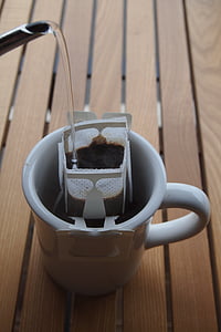 white ceramic mug filled with liquid thumbnail