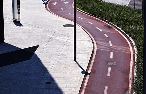 maroon and white line curved road thumbnail