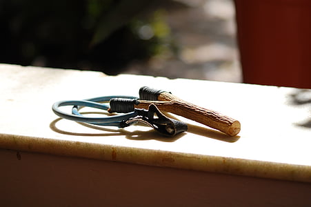 brown wooden slingshot on brown wooden surface thumbnail