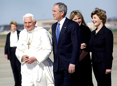 Pope with man wearing blue suit jacket thumbnail