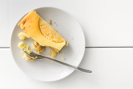 Homemade cheesecake on white plate thumbnail