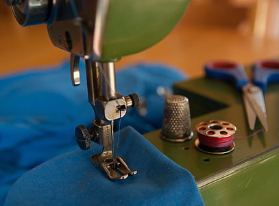 close-up photo of green and gray sewing machine thumbnail