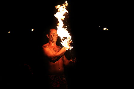 man holding fire thumbnail
