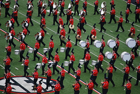 marching bands in middle of football field thumbnail