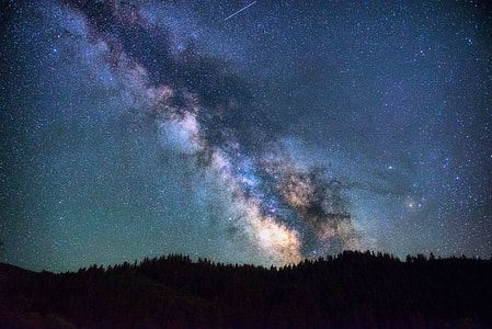 aerial photography of mountain view during nighttime thumbnail