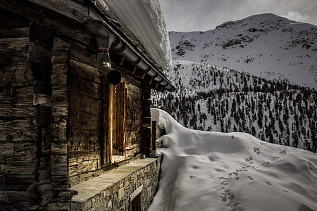 landscape of brick house covered with snow thumbnail