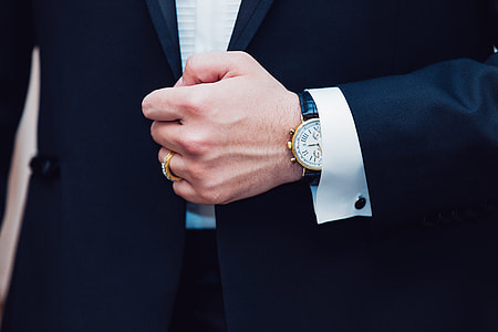 man holding his coat thumbnail