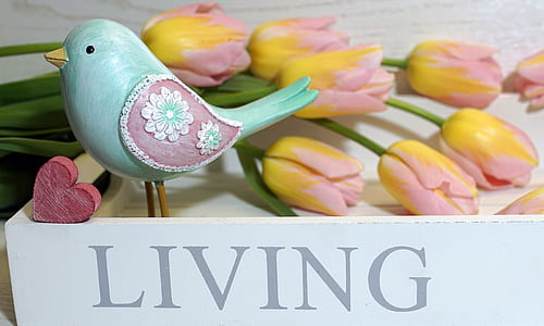 blue bird near yellow-and-pink tulip flowers on Living serving tray thumbnail