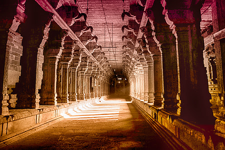 tunnel photography of brown concrete building thumbnail