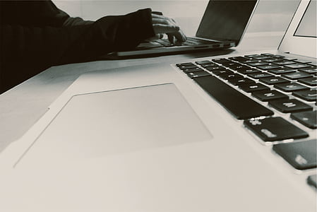person typing on laptop thumbnail