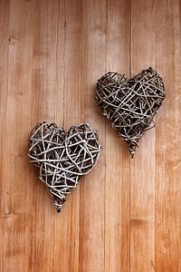 two gray heart decors on floor thumbnail