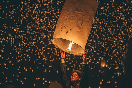 woman holding sky lantern thumbnail