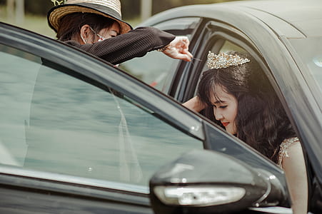 Bride Stepping Out of the Car thumbnail