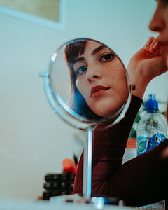 woman facing mirror thumbnail