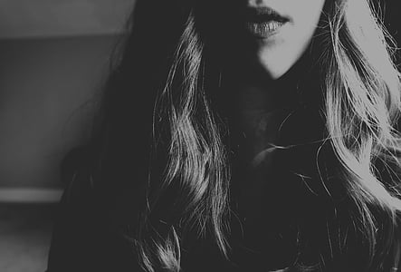 grayscale photo of woman standinfg thumbnail