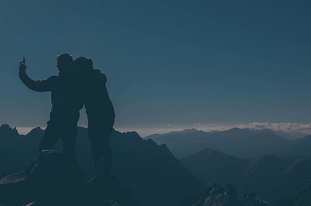photo of couple on cliff thumbnail