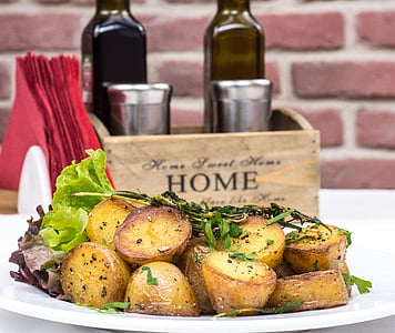 round sliced brown dishes filled white plate thumbnail