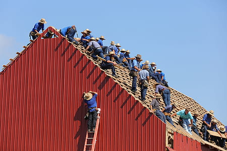 group of men fixing house roof thumbnail