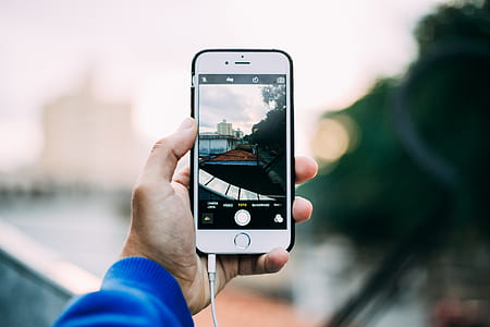 silver iPhone 6 with black case thumbnail