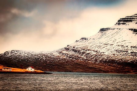 house beside a river in the mountainside thumbnail