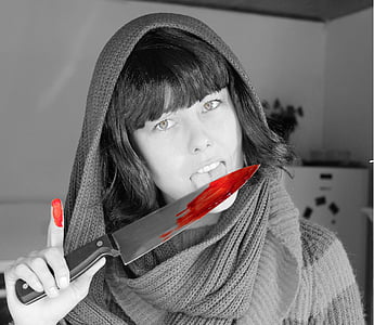 selective color photography of red blood stains on knife thumbnail