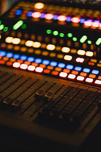black and gray DJ mixer with equalizer turned on thumbnail